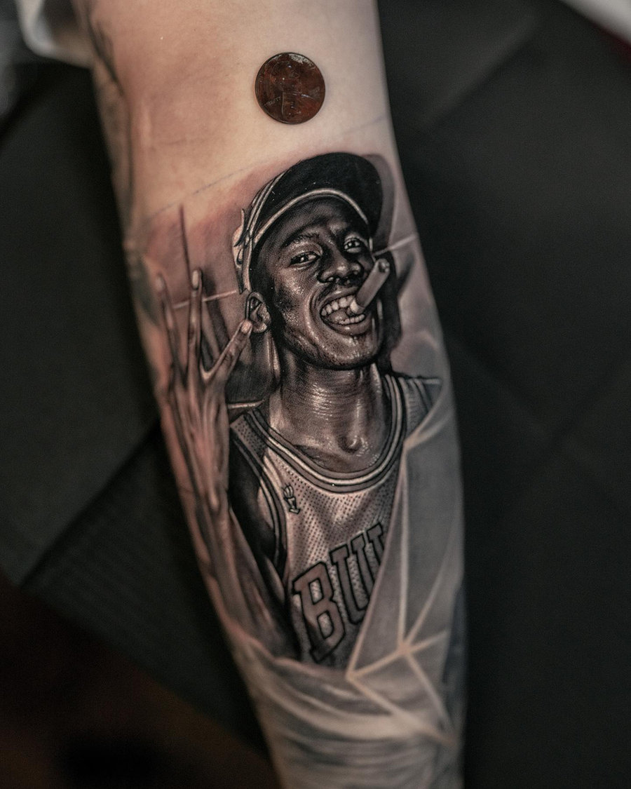 Michael Jordan realism portrait tattoo on forearm